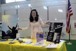 Jessica Leone, Program Director for Transitioning Youth at a Baltimore City Expo event educating teens.