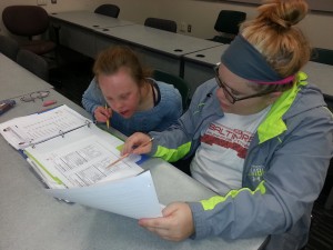 Two UMBC SUCCESS Students working together on a assignment. 