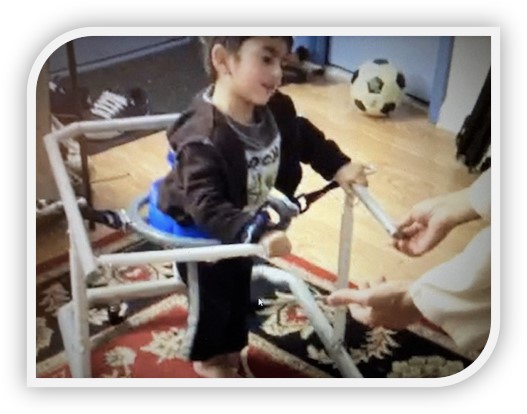 Abdurrahman using his new walker.