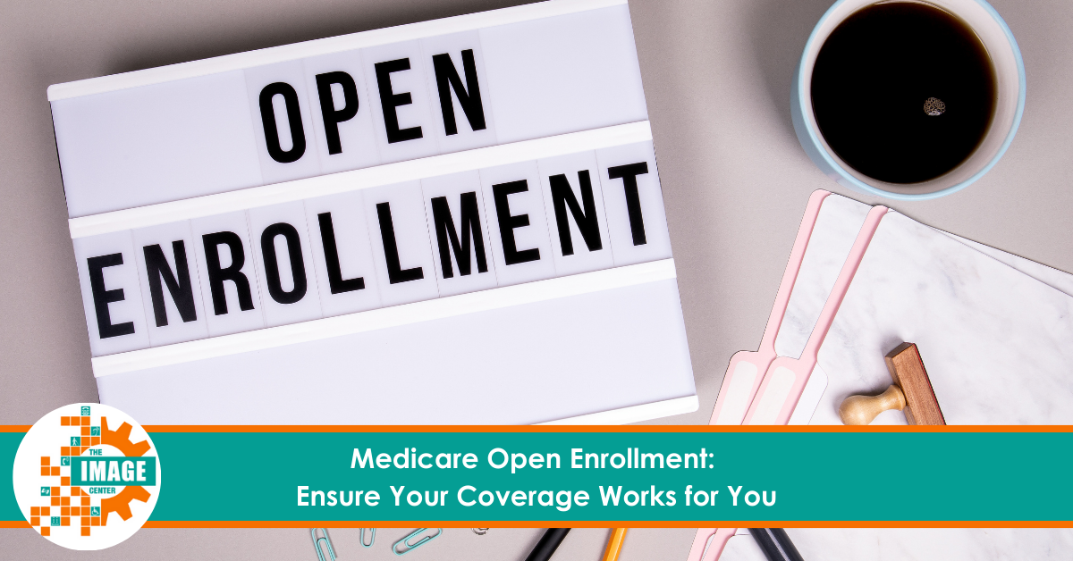 A sign with bold letters reads "Open Enrollment" alongside a cup of coffee, clipboard, and office supplies on a desk. A banner at the bottom says, "Medicare Open Enrollment: Ensure Your Coverage Works for You," with The Image Center's logo on the left side.