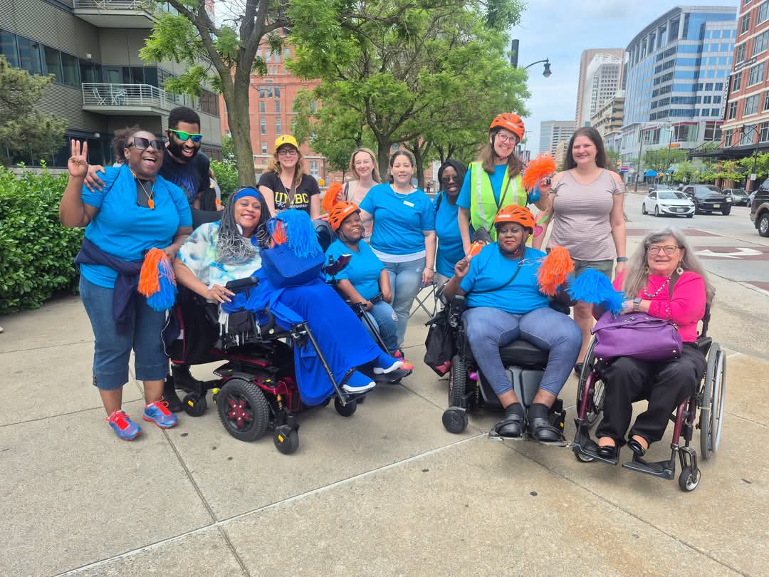 "Group photo of the full cheer squad for image man kinetic sculpture race in baltimore"